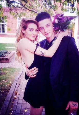 Maille Stymest and his ex-husband Ash Stymest hugging each other